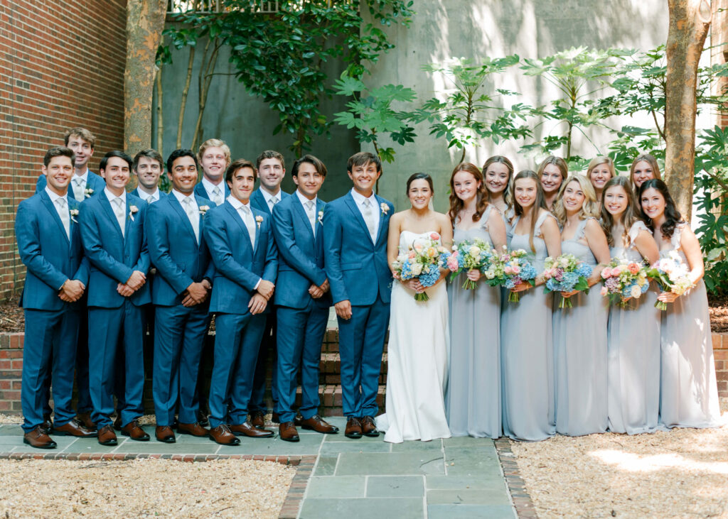 Grey bridesmaids dresses and colorful bouquets. Photos by a Birmingham, AL wedding photographer