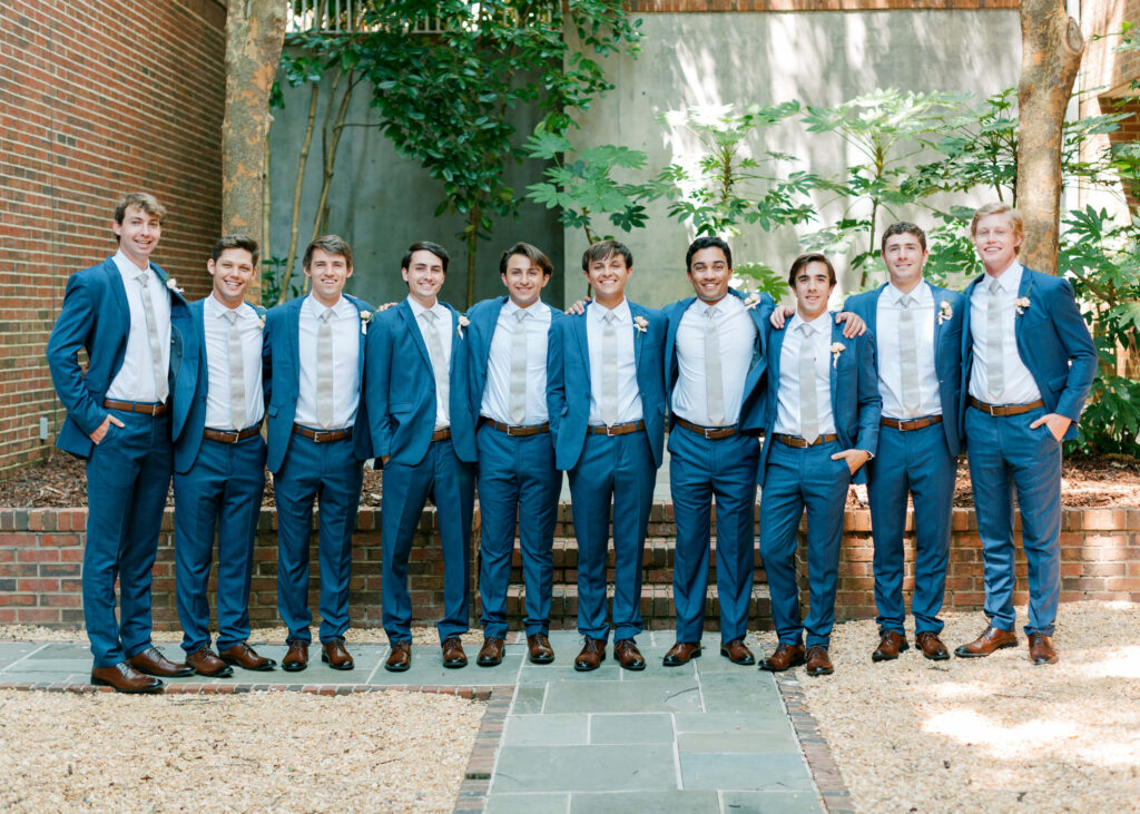 Navy blue groomsmen suits. Photos by a Birmingham, AL wedding photographer