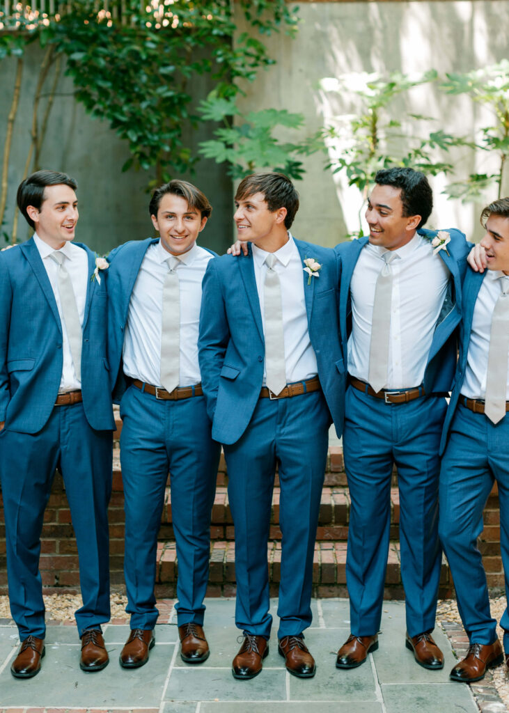 Navy blue groomsmen suits. Photos by a Birmingham, AL wedding photographer