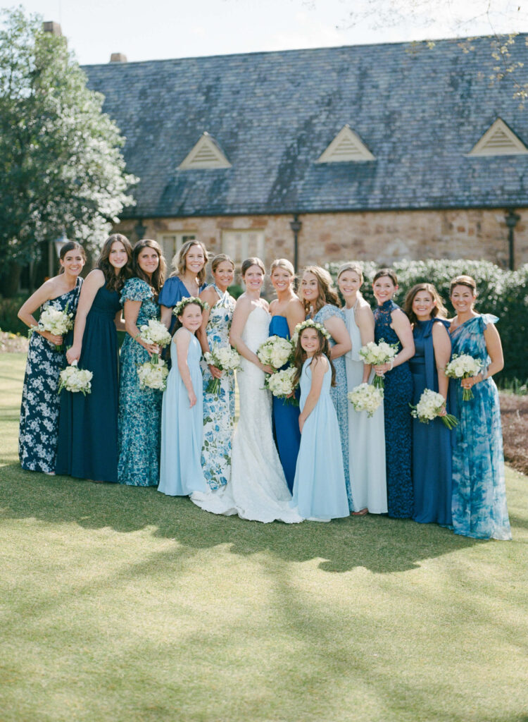 Different blue bridesmaids dresses at Country Club of Birmingham