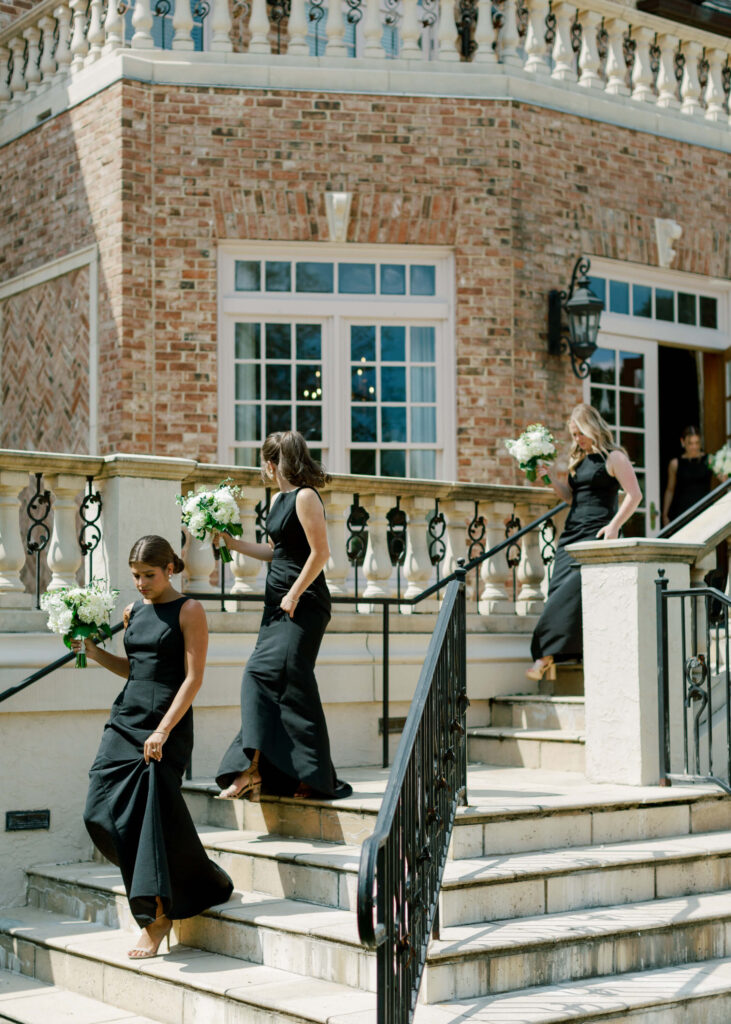 Black bridesmaids dresses photographed by a Birmingham AL film wedding photographer