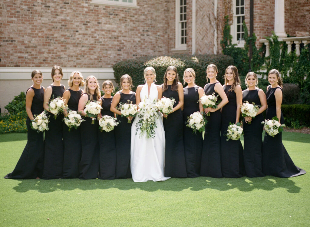 Black bridesmaids dresses photographed by a Birmingham AL film wedding photographer