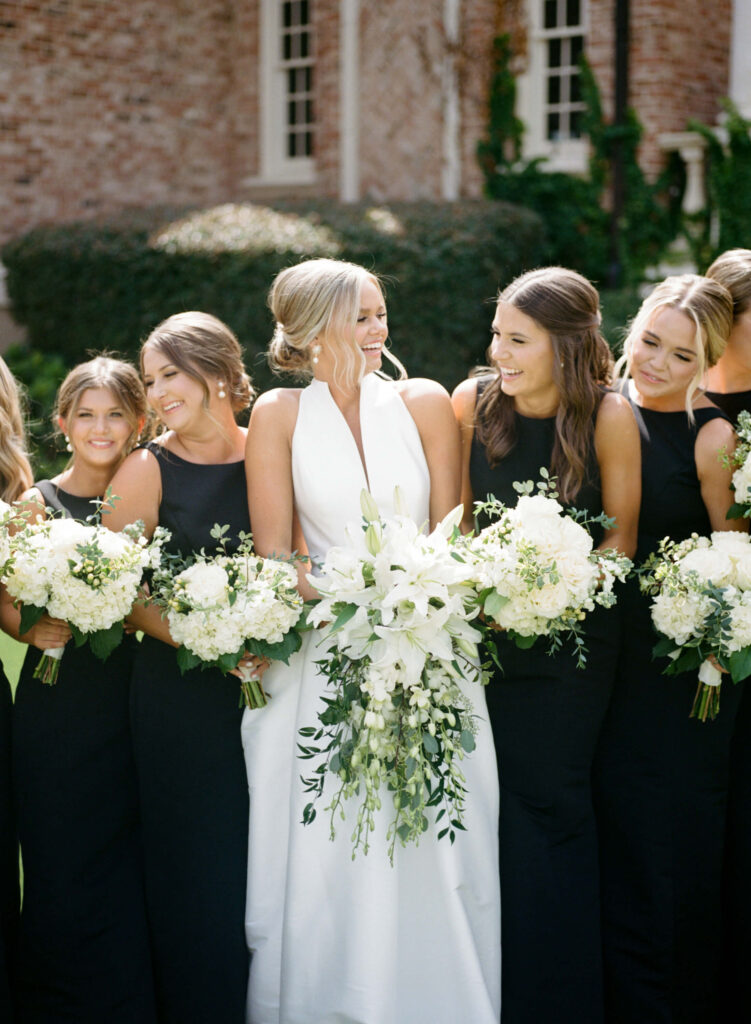 Black bridesmaids dresses photographed by a Birmingham AL film wedding photographer