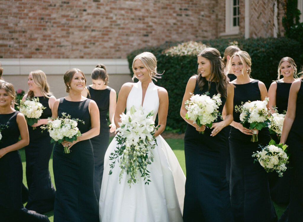 Black bridesmaids dresses photographed by a Birmingham AL film wedding photographer