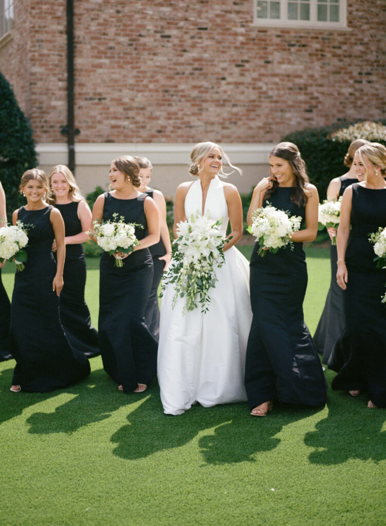 Black bridesmaids dresses photographed by a Birmingham AL film wedding photographer