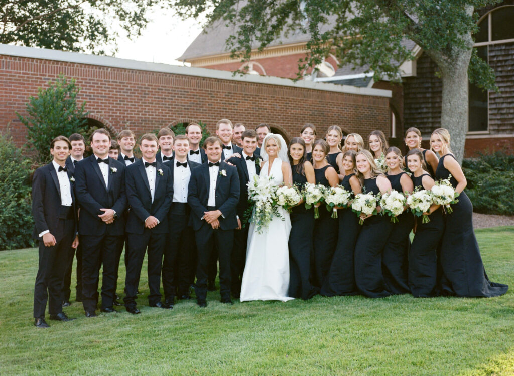 Black bridesmaids dresses photographed by a Birmingham AL film wedding photographer