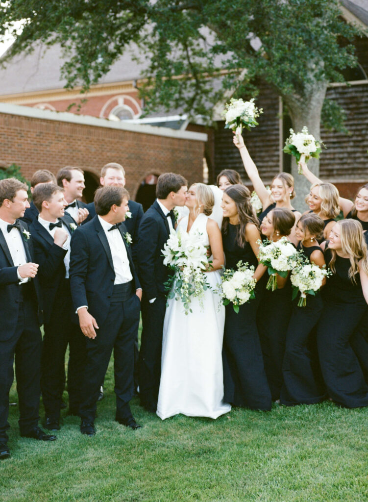 Black bridesmaids dresses photographed by a Birmingham AL film wedding photographer