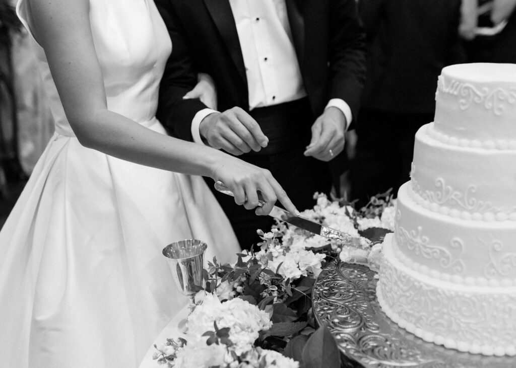 Cake cutting at a Fountainview Mansion wedding in Auburn, AL