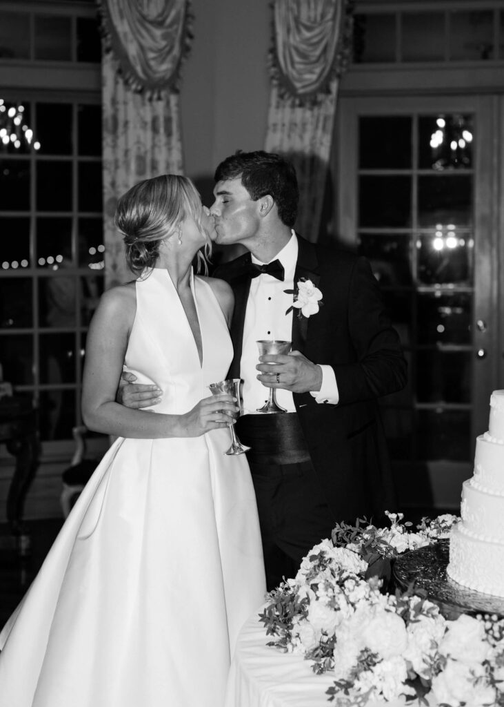 Cake cutting at a Fountainview Mansion wedding in Auburn, AL