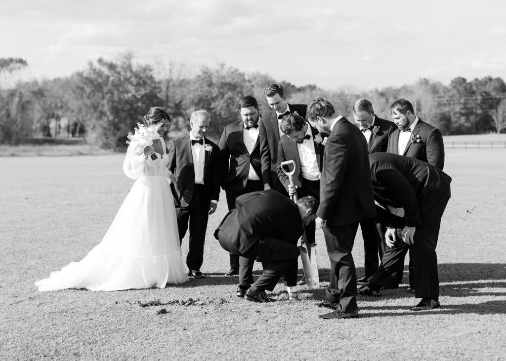 Digging up the bourbon at a Private Estate wedding in Pike Road, Alabama