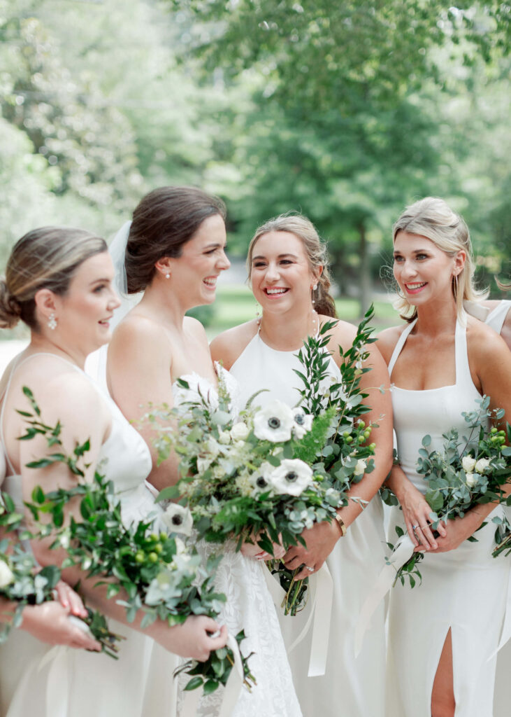 White bridesmaid dresses at a St. Luke's Episcopal wedding in Birmingham, AL