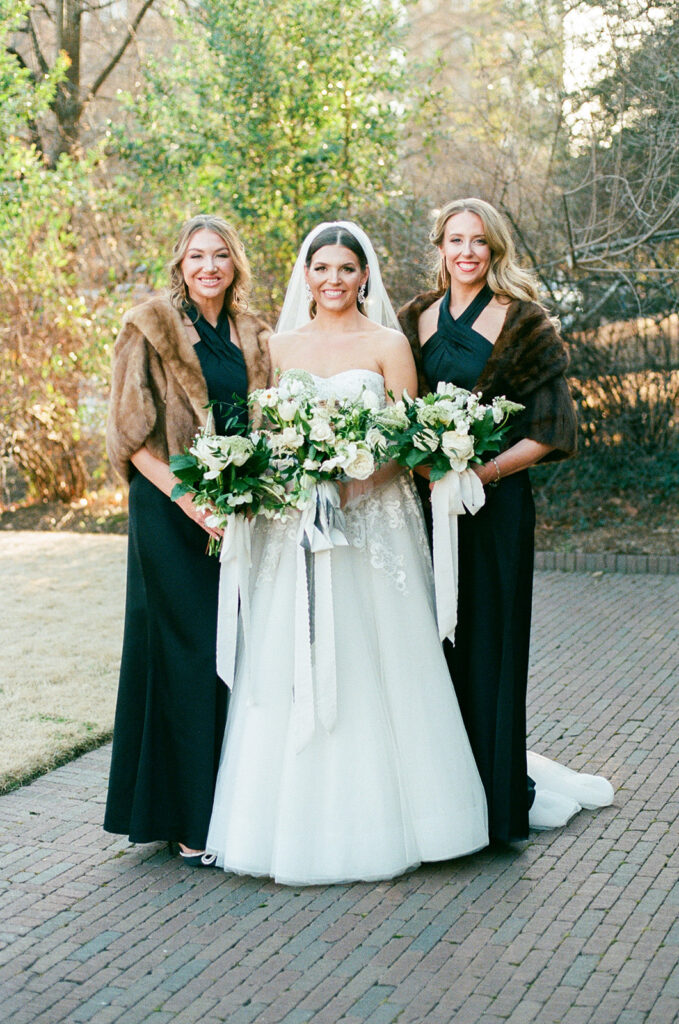 Black bridesmaid dresses at a Clubhouse on Highland in Birmingham, AL