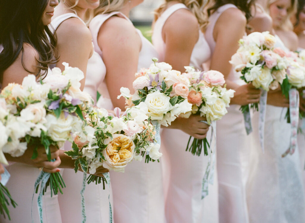 Light pink bridesmaids dresses at the Birmingham Botanical Gardens