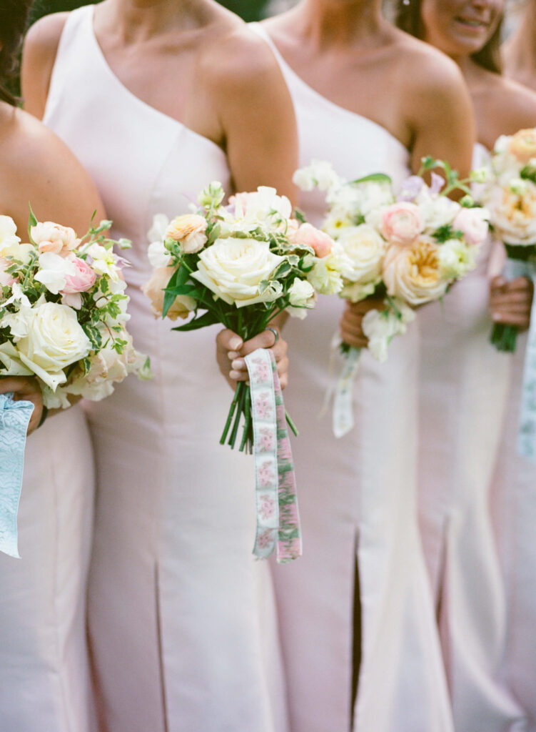 Light pink bridesmaids dresses at the Birmingham Botanical Gardens
