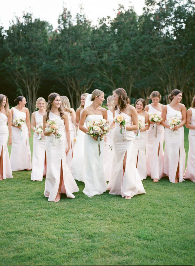 Light pink bridesmaids dresses at the Birmingham Botanical Gardens