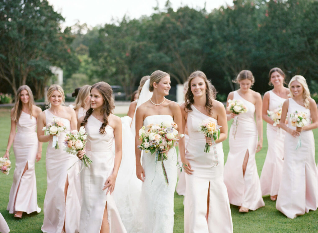 Light pink bridesmaids dresses at the Birmingham Botanical Gardens