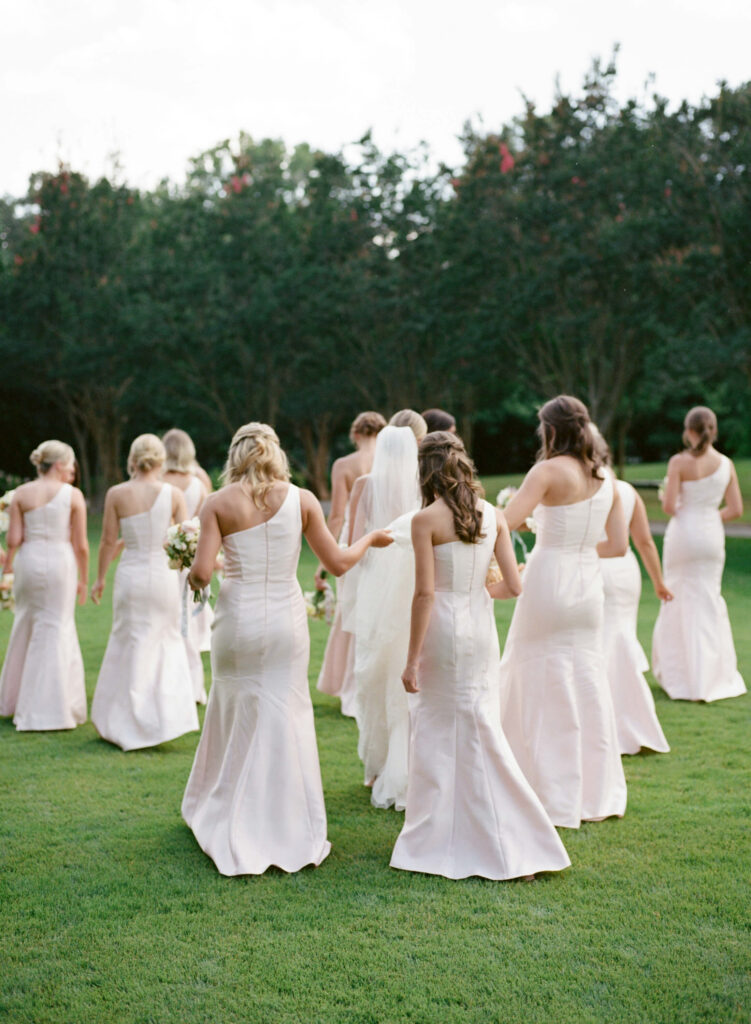 Light pink bridesmaids dresses at the Birmingham Botanical Gardens