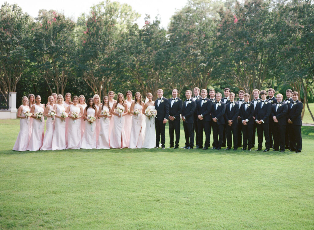 Light pink bridesmaids dresses at the Birmingham Botanical Gardens
