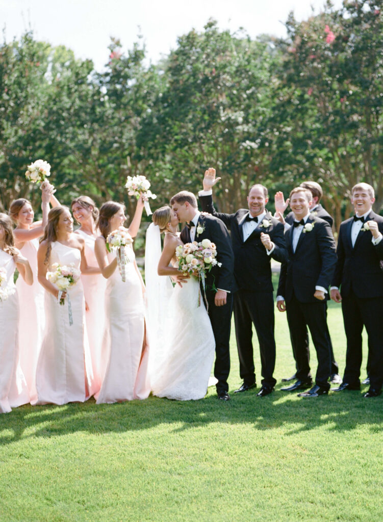 Light pink bridesmaids dresses at the Birmingham Botanical Gardens