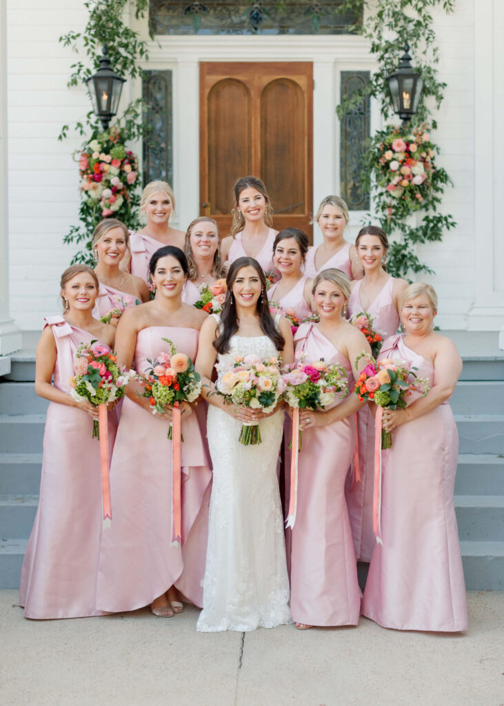 Pink bridesmaids dresses at a wedding at The Colonnade House in Columbus, MS