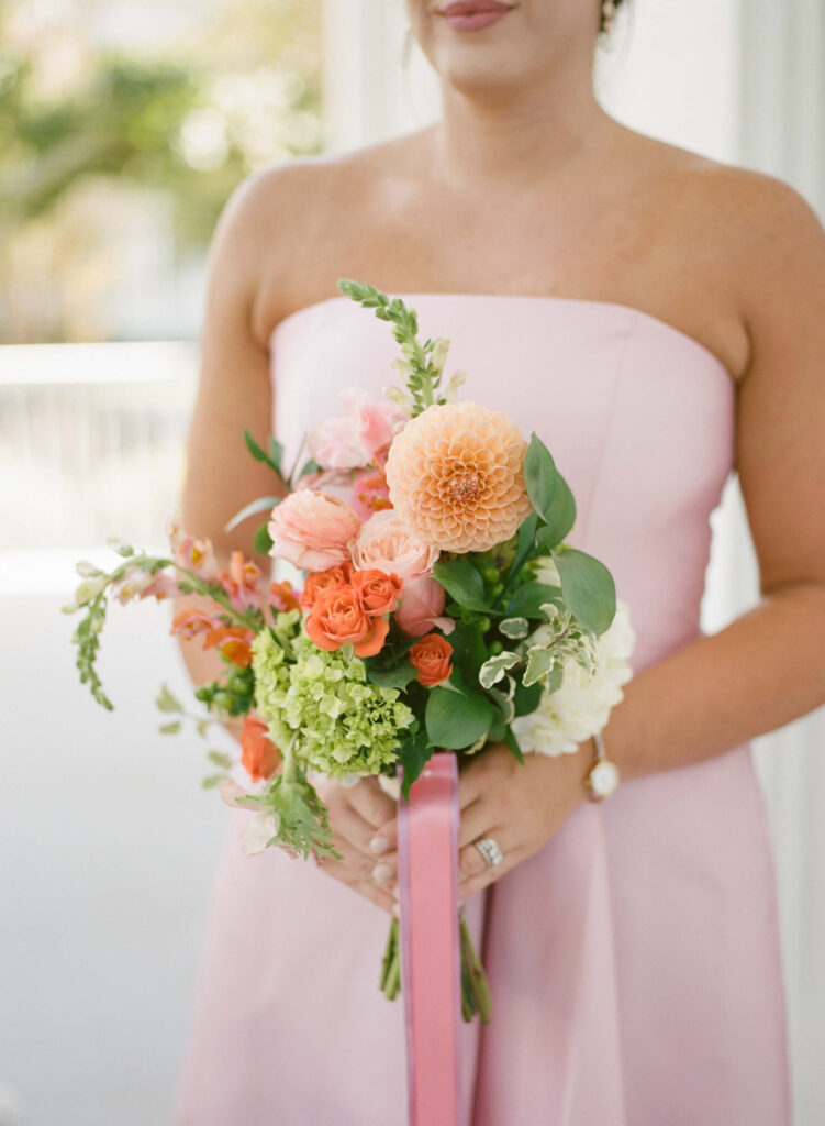 Pink bridesmaids dresses at a wedding at The Colonnade House in Columbus, MS