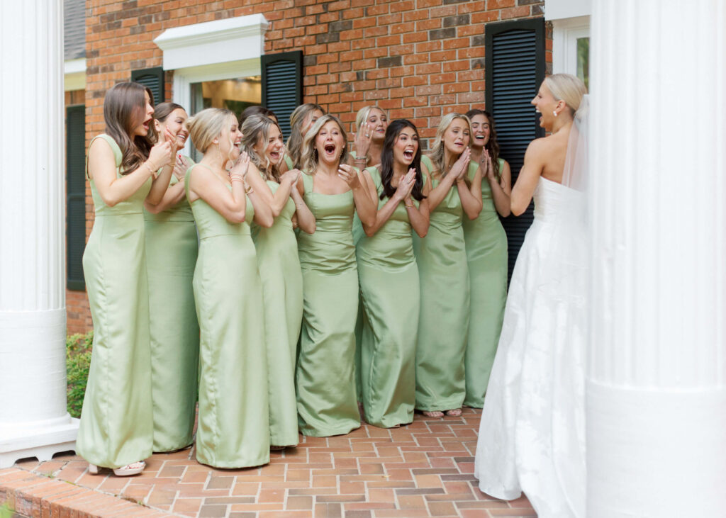 Bridesmaid first look with apple green bridesmaids dresses
