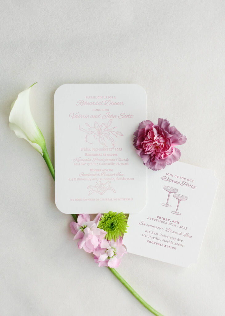Pink letterpressed rehearsal dinner invitation